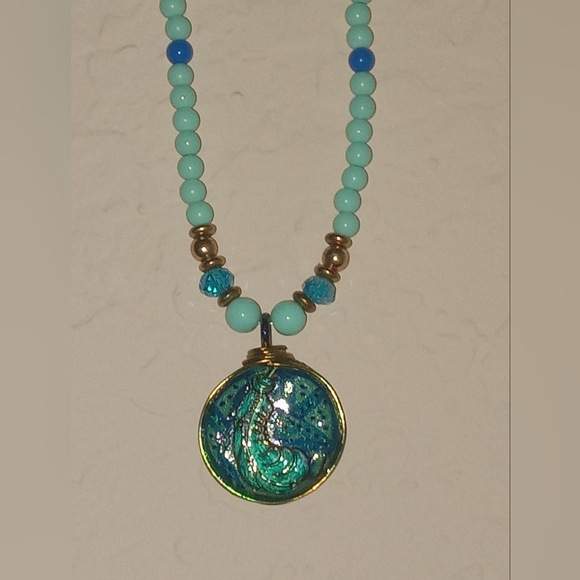 Blue green feather emblem necklace - Picture 2 of 3